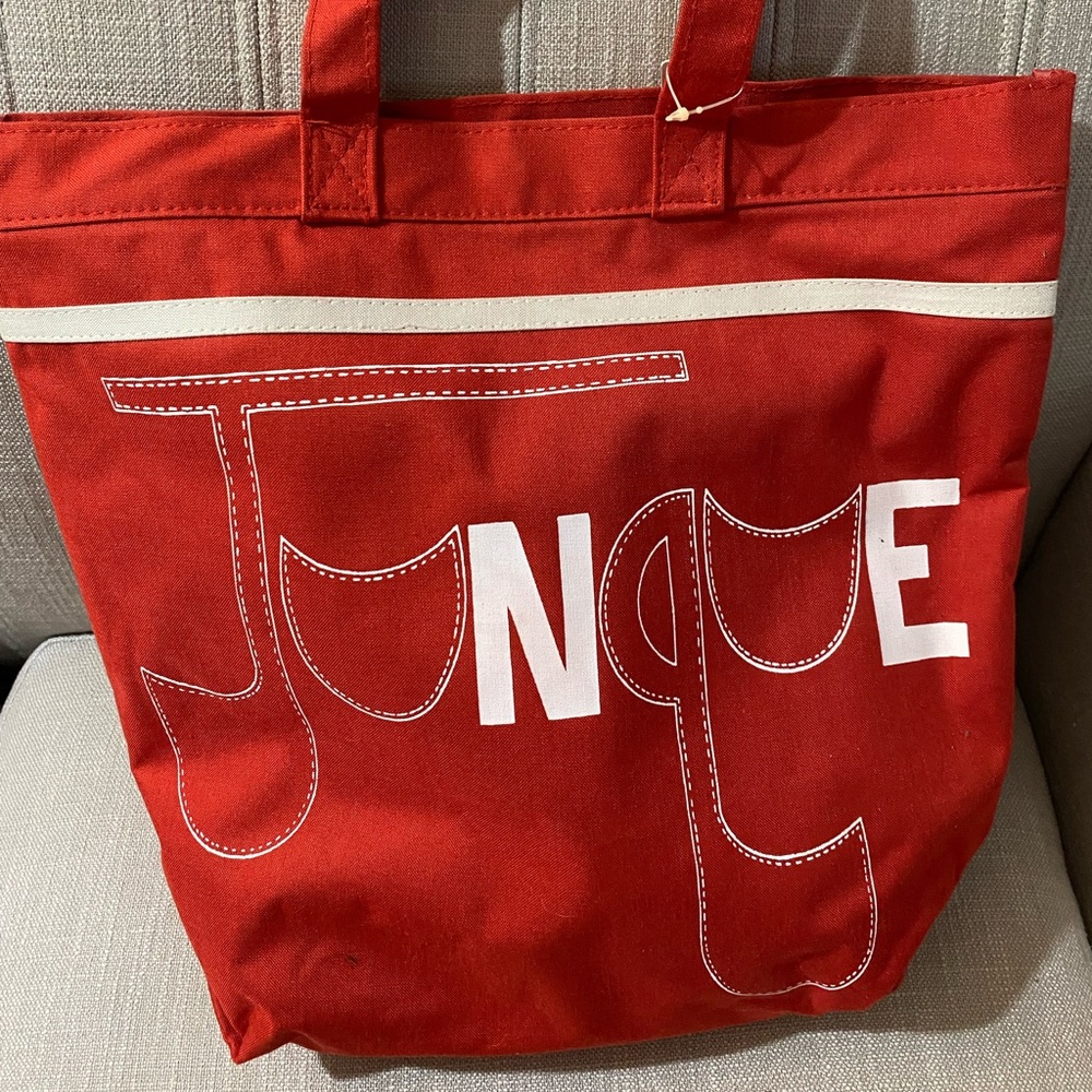 Vintage waxed canvas red tote bag with white graphic